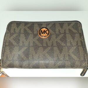 Michael Kors Monogram Zip-Around Wallet in Brown